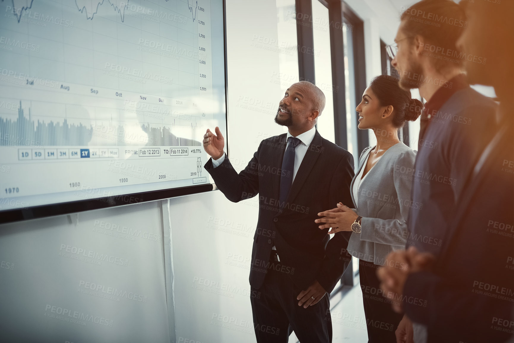 Buy stock photo Shot of a mature businessman giving a presentation in the boardroom