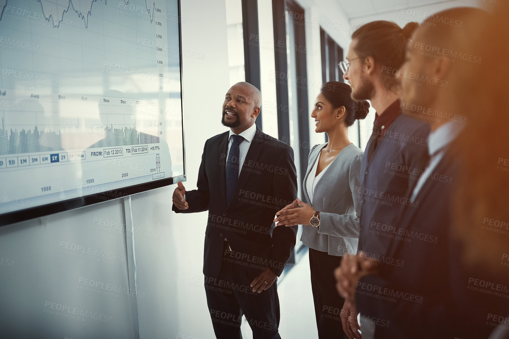 Buy stock photo Shot of a mature businessman giving a presentation in the boardroom