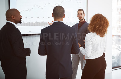 Buy stock photo Business, group and man with a presentation, corporate training and financial review with teamwork. Finance, staff or presenter with a chart, graphs or feedback for a budget, collaboration and growth