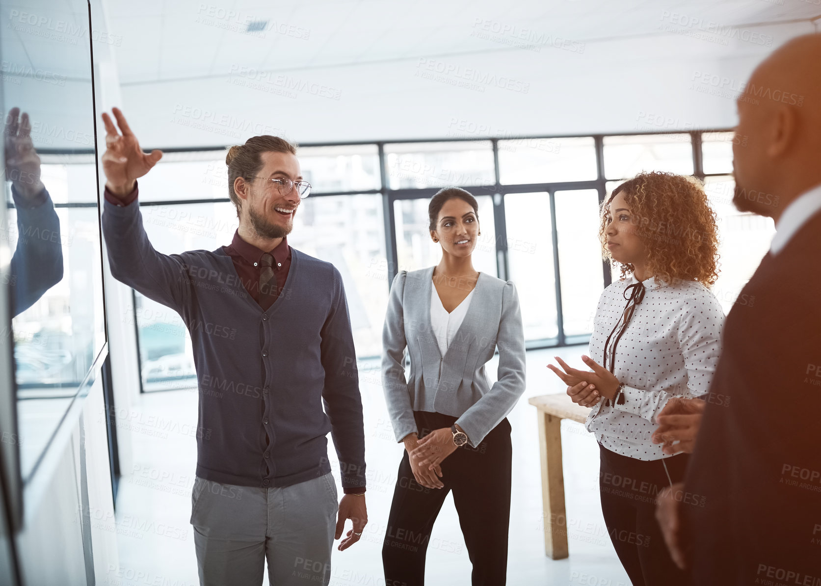 Buy stock photo Teamwork, colleagues in a business meeting and planning in a office of their workplace. Data review or statistics, collaboration or presentation and people in a workshop for performance strategy