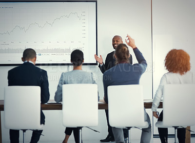 Buy stock photo Shot of a mature businessman giving a presentation in the boardroom