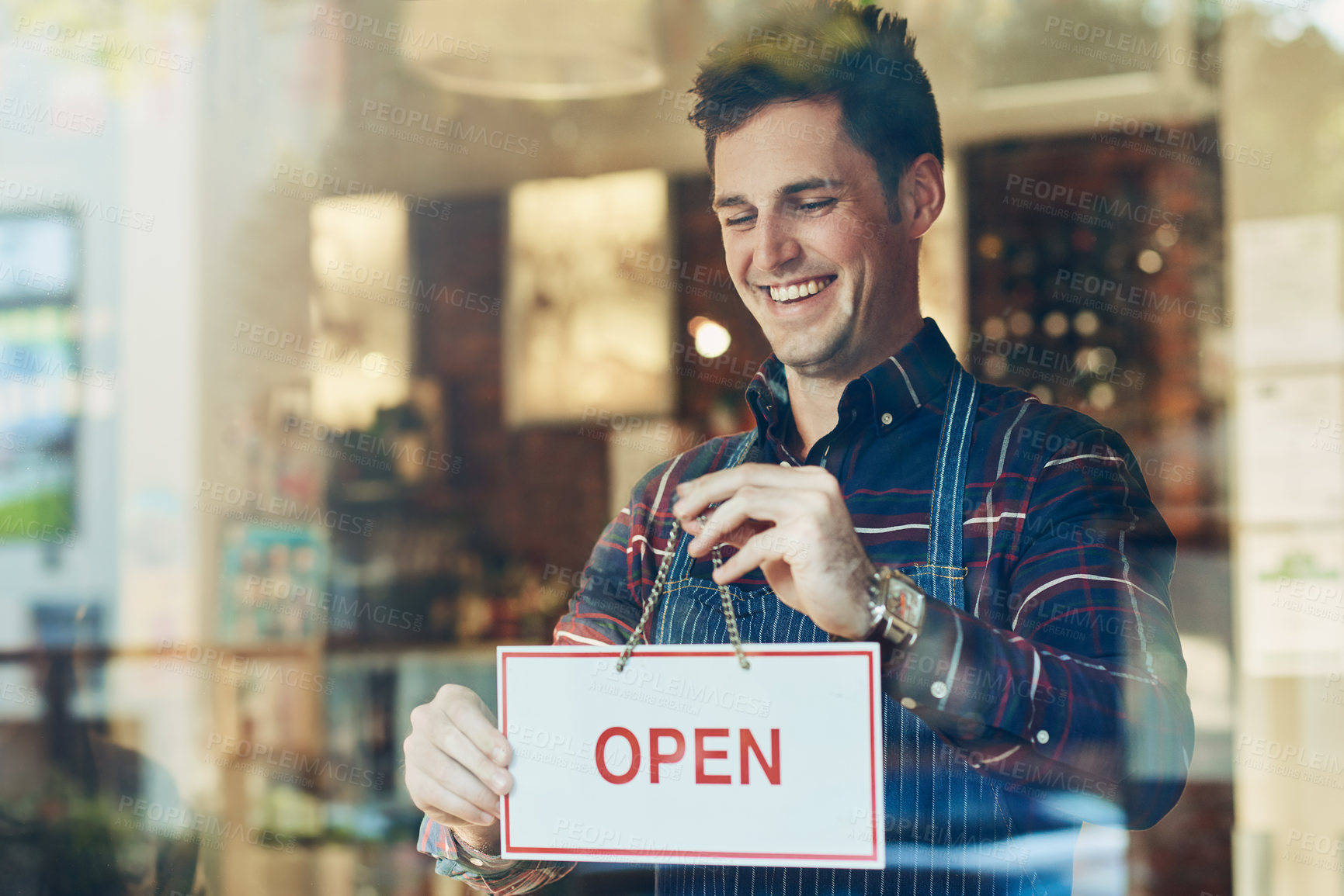 Buy stock photo Open sign, cafe and man with business, startup and poster with service, board and franchise window. Male person, happy employee and entrepreneur with a waiter, new and opening store with hospitality