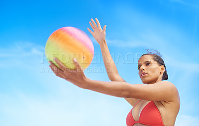 Buy stock photo Beach, volleyball and woman with fitness, sunshine and weekend break with recreation and activity. Person, athlete and girl with fun and playing with workout and hobby for wellness, summer or healthy