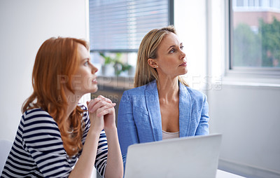 Buy stock photo Office, thinking and women at laptop together with insight, inspiration and brainstorming at startup. Businesswomen, partnership and professional team at desk with ideas, online research and planning