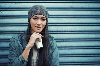 Buy stock photo Woman, fashion and coffee with portrait, urban and city street or background for style. Asian student, beanie and jacket in cape town with winter, cold and planning with metal garage door with denim