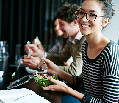 Buy stock photo Meeting, smile and portrait of woman with salad in office for team building lunch for collaboration. Discussion, happy and Asian female designer with colleagues eating healthy meal in workplace.