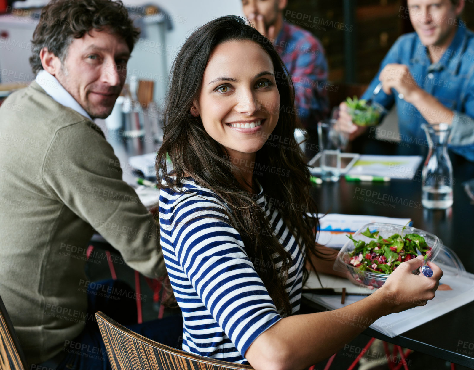 Buy stock photo Meeting, eating and business woman with salad in office for team building lunch for collaboration. Discussion, smile and portrait of female designer with colleagues enjoying healthy meal in workplace