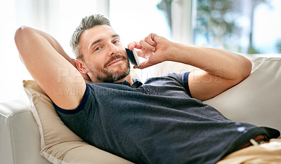 Buy stock photo Portrait, man and couch on call with smartphone enjoying day off from work, talking and network on digital technology. Happy, male person and relaxing at home in lounge on cellphone to communicate 