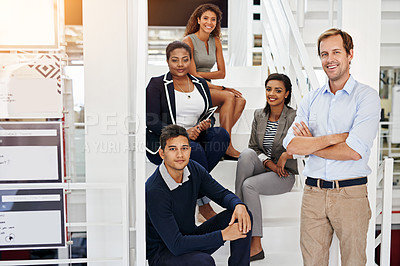 Buy stock photo Portrait of a group of coworkers in a stairwell in a modern office