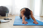 Increasing her flexibility, strength and balance through yoga