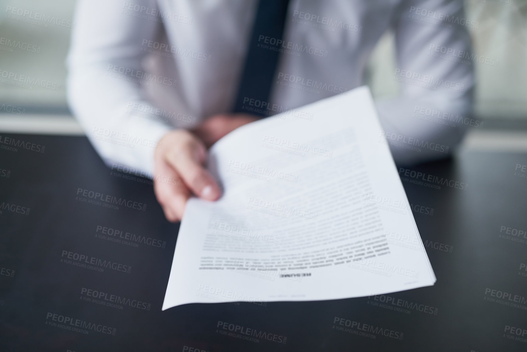 Buy stock photo Cropped shot of a job hunter handing in a resume in an office