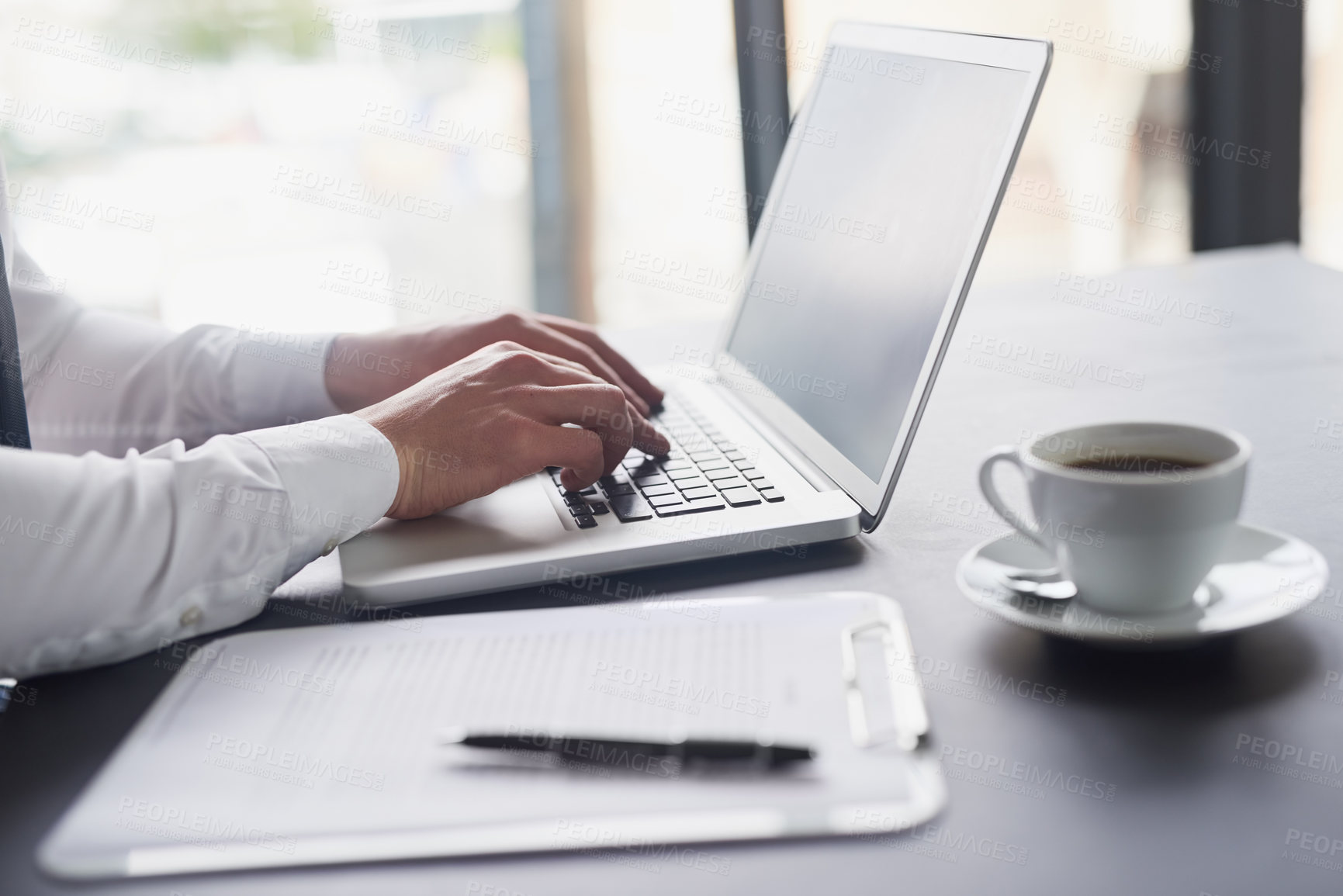 Buy stock photo Shot of a white collar businessman working in his office