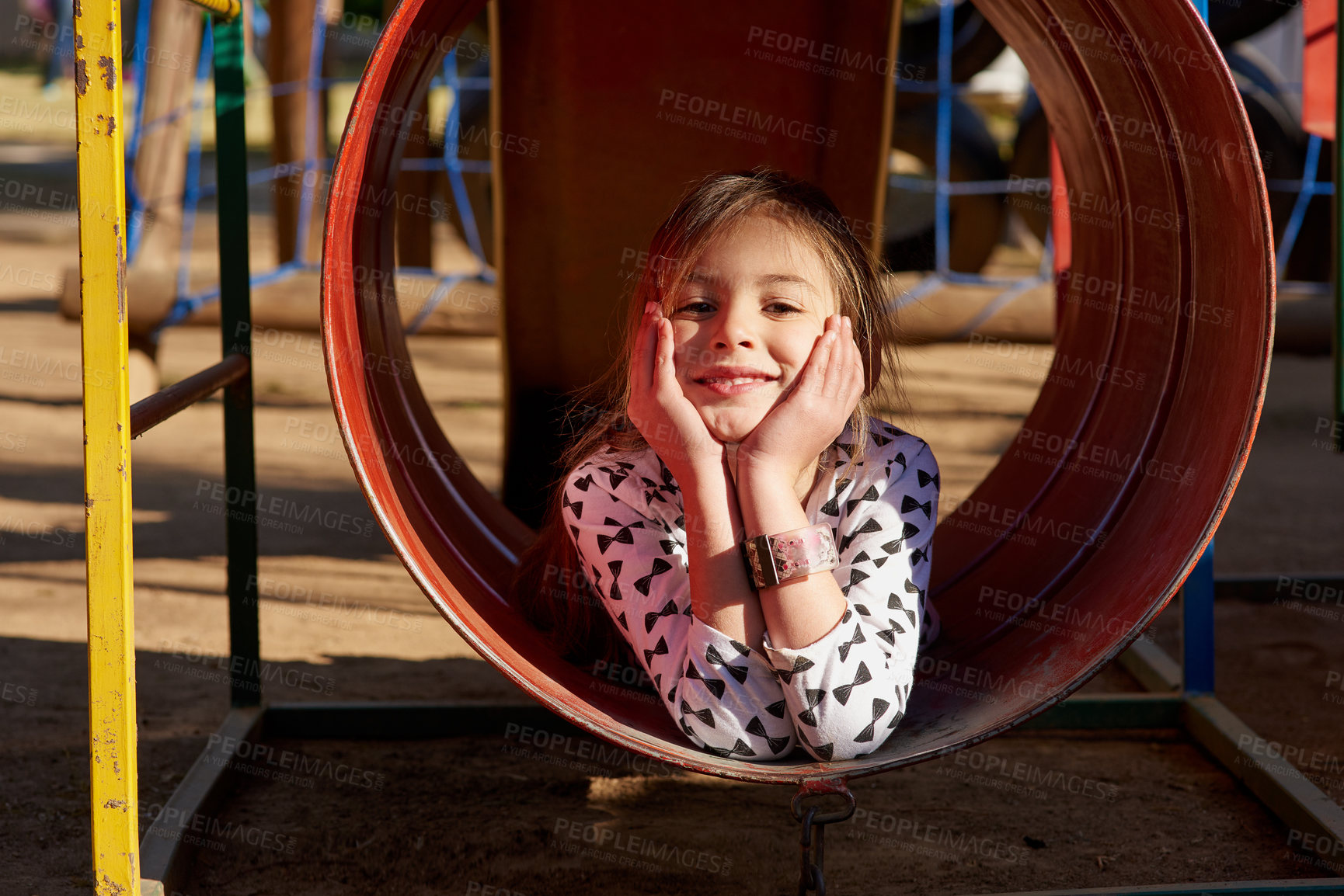Buy stock photo Portrait, slide and playground for child in nature, park and garden for play and fun. Face, freedom and outdoors and games for energy for childhood development, vacation and weekend break in summer  
