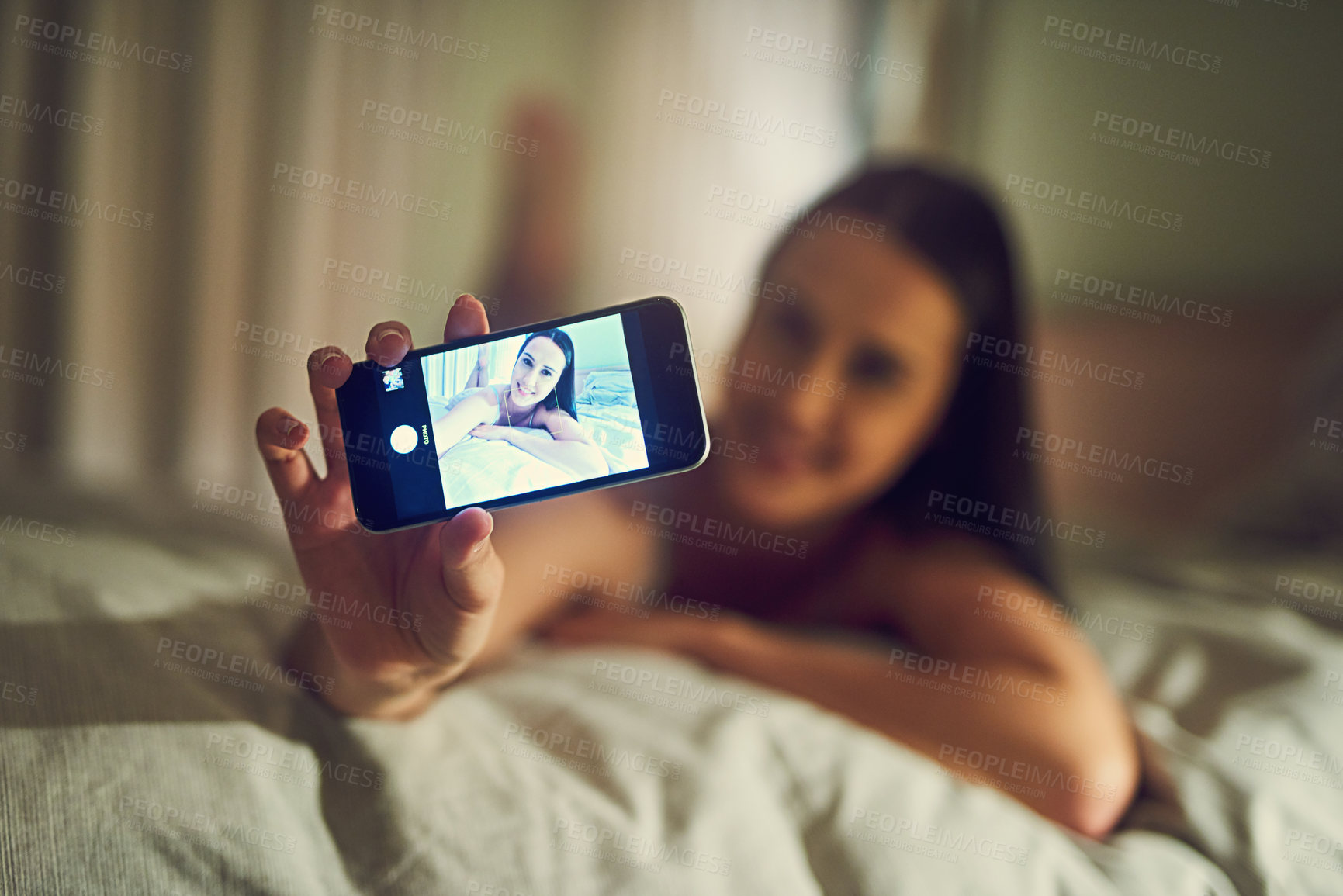 Buy stock photo Selfie, phone screen and woman on bed at night for social media, live streaming and portrait in home. Gen z, influencer and technology in apartment for profile picture, blog and photography in room
