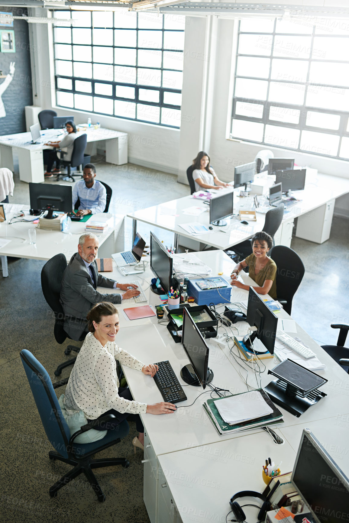 Buy stock photo Happy, above and business people in office, computer and teamwork with news room. Portrait, group and employee with pc, journalist and editing with opportunity, research for project and magazine