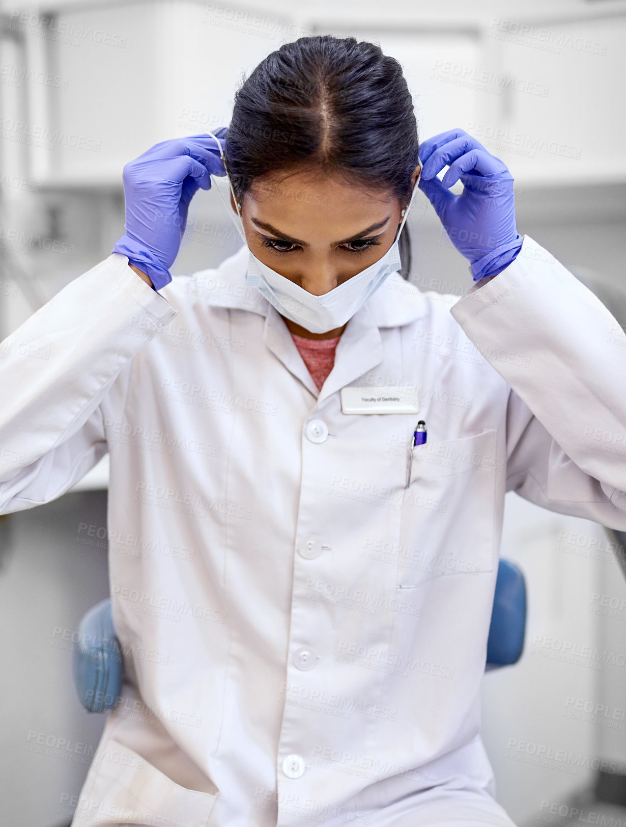 Buy stock photo Girl, face mask and prepare in hospital for surgery or medical protocol, protective gear and safety for virus or hygiene in clinic. Woman, doctor and surgeon professional for healthcare and medicine.