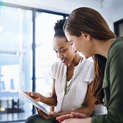 Buy stock photo Cropped shot of two designers working together in the office