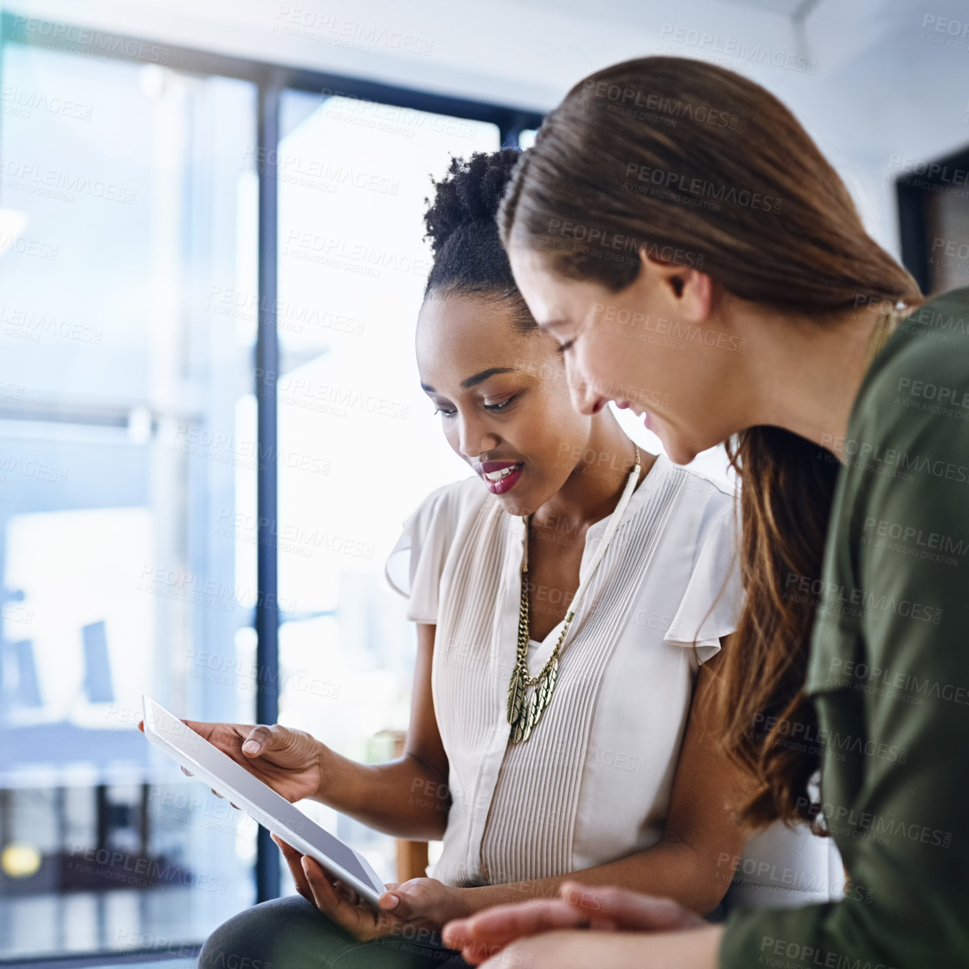 Buy stock photo Cropped shot of two designers working together in the office