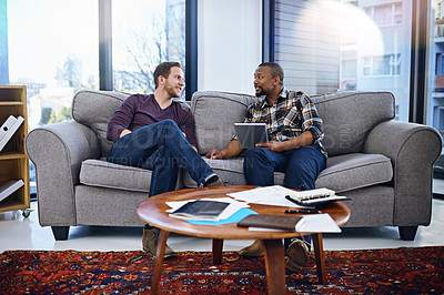 Buy stock photo Business people, teamwork and meeting on sofa with tablet for collaboration and planning of creative software. Graphic designer, men or clients relax on couch in office with digital ideas and advice