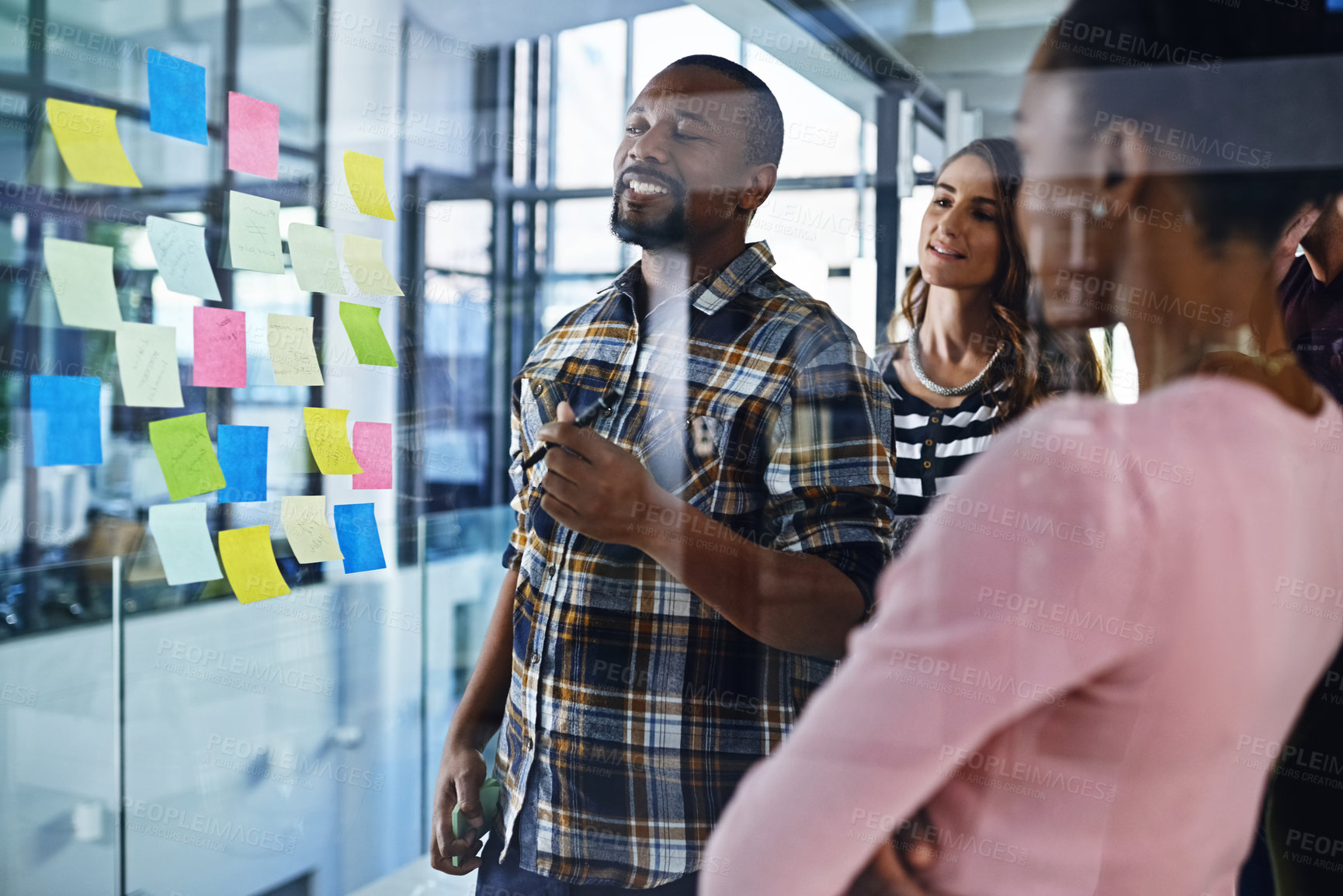 Buy stock photo Glass, planning and business people in office for training, collaboration and writing goal objectives. Teamwork, schedule and manager with group and storyboard notes on growth, target or coaching