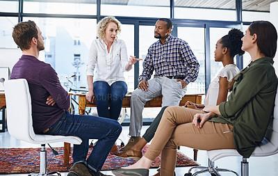 Buy stock photo Woman, coach and meeting with creative team for project discussion, delegation or presentation at office. Female person or mentor talking to group of employees for staff training, ideas or startup