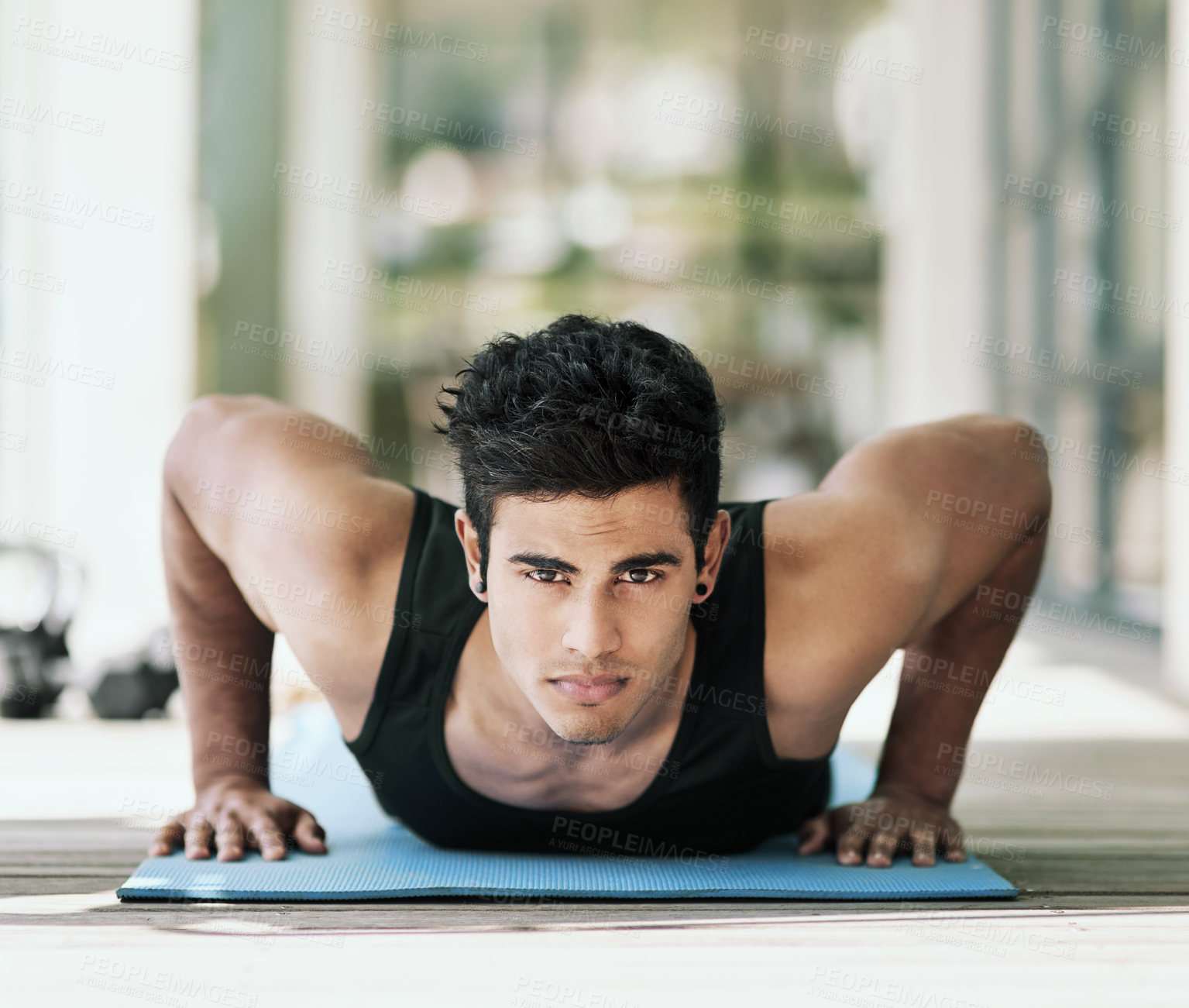 Buy stock photo Portrait, man and push up on yoga mat for wellness, health and exercise in fitness, sports and cardio. Male person, athlete and home gym for training, muscle and endurance for body or challenge