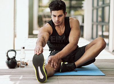 Buy stock photo Man, stretching and exercise for legs in home and start with healthy preparation for workout. Training, flexibility and athlete warm up body with yoga for fitness, challenge and prevent sports injury