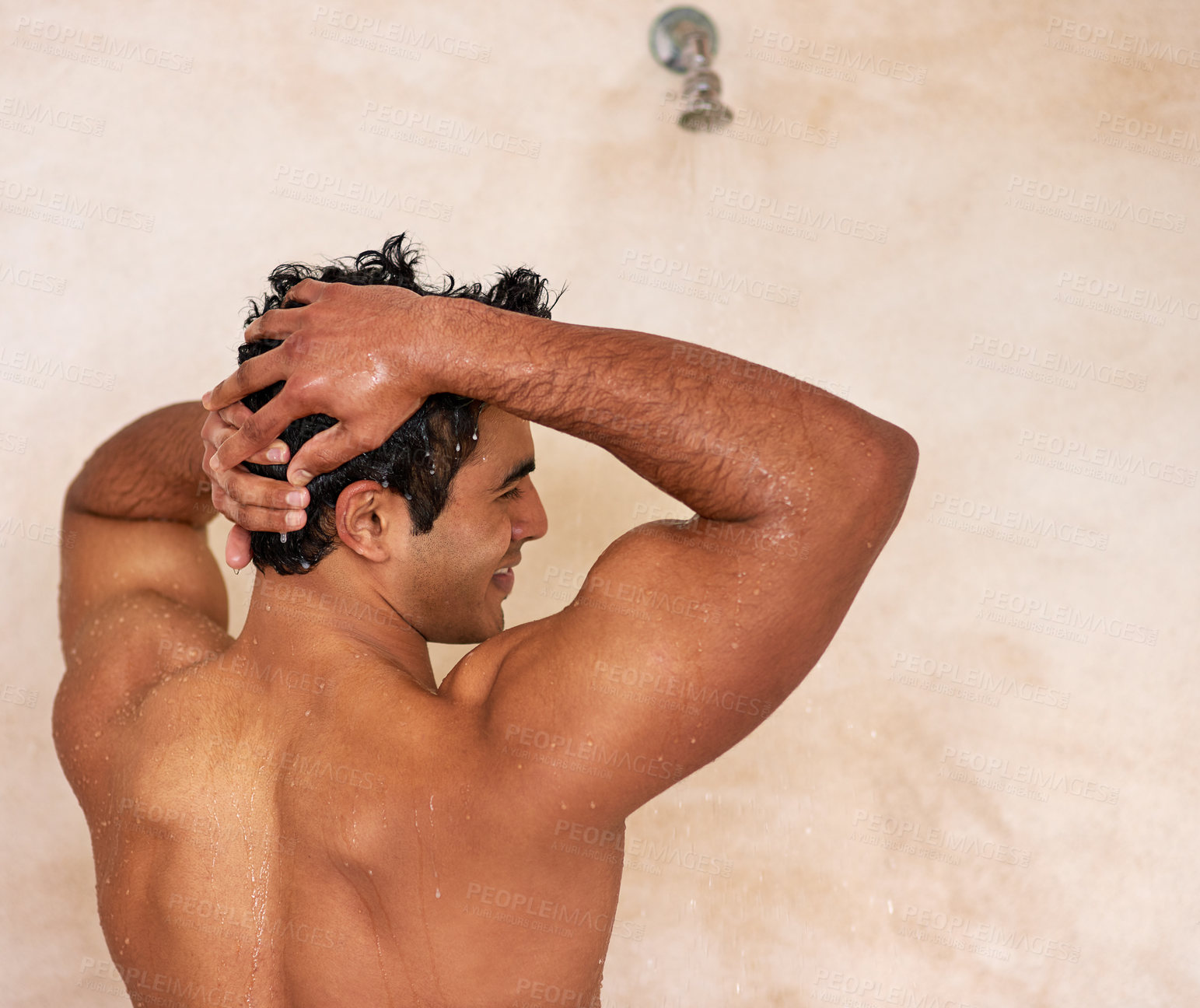 Buy stock photo Shot of a handsome young man enjoying a refreshing shower