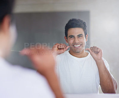 Buy stock photo Smile, mirror and man with floss in bathroom for dental hygiene, gum disease and oral care. Health, happy and person in reflection after brushing teeth for wellness, cleaning and fresh breath in home