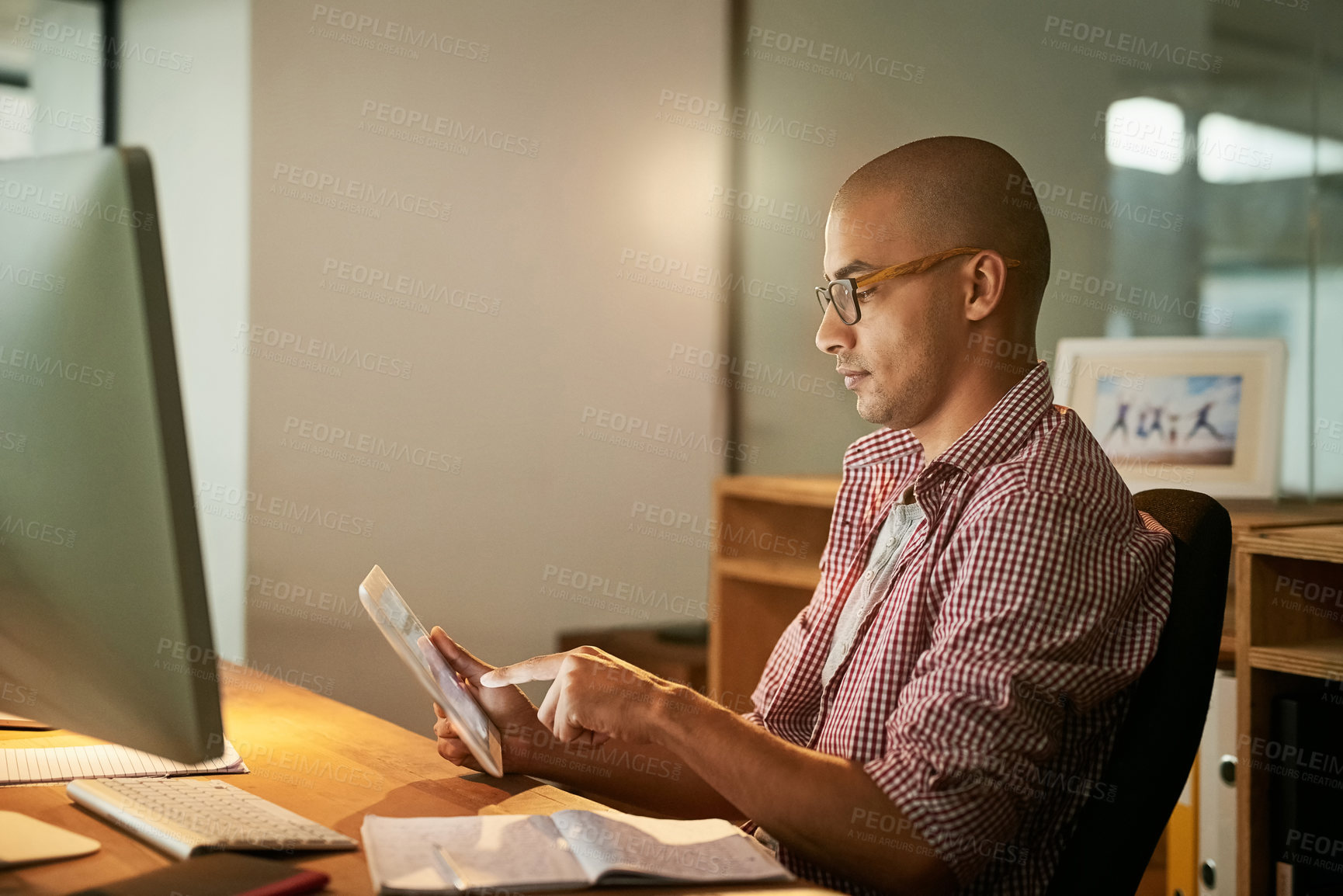 Buy stock photo Man, work and office with tablet for designer agency or research for industrial design, innovation and software. Male person, digital technology and cad for systems or creative company and overtime.