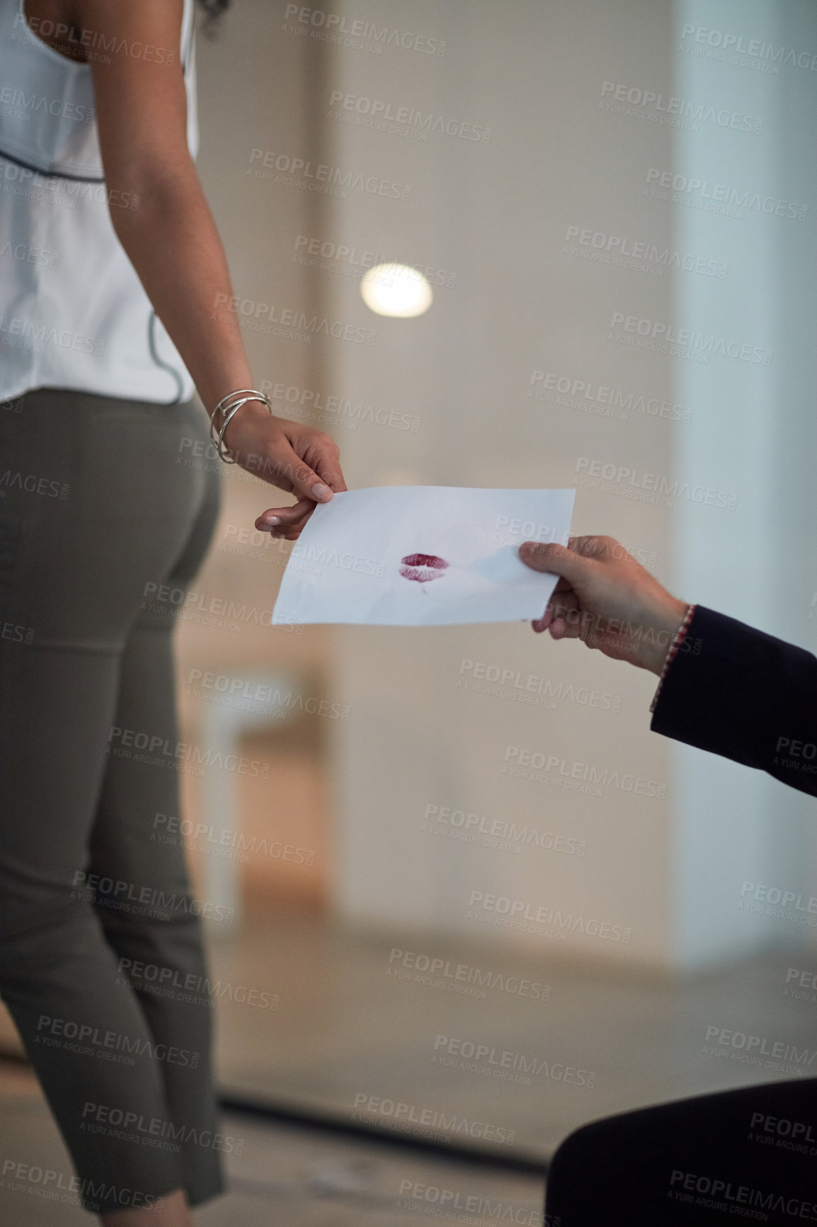 Buy stock photo Business people, hands and passing with love letter at office for valentines day, romance or secret admirer. Closeup of employees holding paper with lipstick for romantic message from anonymous lover