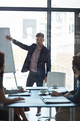 Buy stock photo Professional man, presenter and presentation on whiteboard for proposal, statistics and financial growth in meeting. Business accountant or analyst and graph for revenue, profit or report on increase