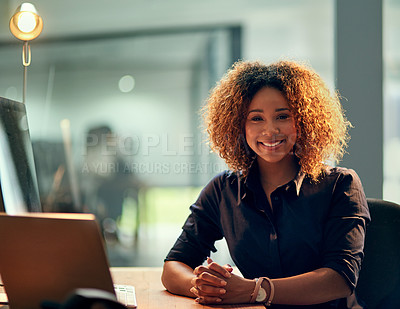 Buy stock photo Portrait of a happy young businesswoman using a laptop during a late night at work