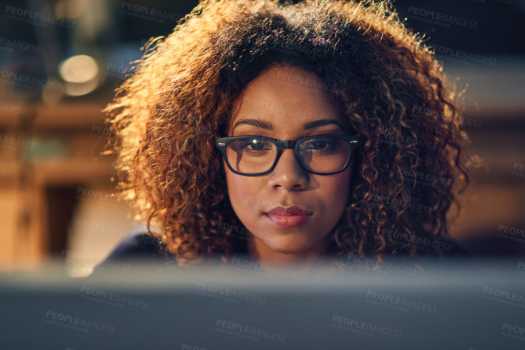 Buy stock photo Black businesswoman, working and late night with glasses on computer in evening for work deadline. Corporate, office and content writer or freelance with editing, blogging and script for career.