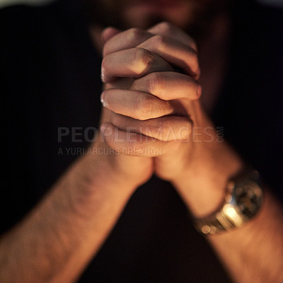 Buy stock photo Closeup shot of a man with his hands clasped in prayer