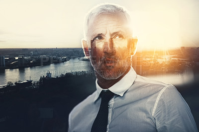 Buy stock photo Shot of a handsome mature businessman superimposed over a cityscape
