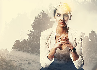 Buy stock photo Portrait of an attractive young businesswoman superimposed over a forest landscape