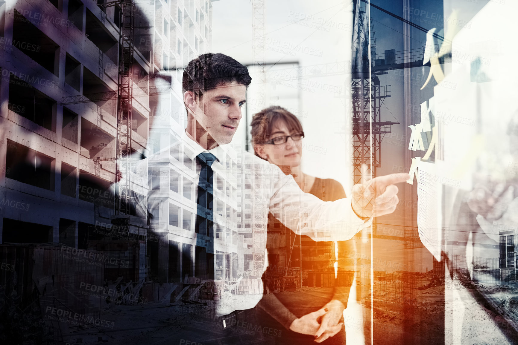 Buy stock photo Shot of a corporate business meeting superimposed over a cityscape