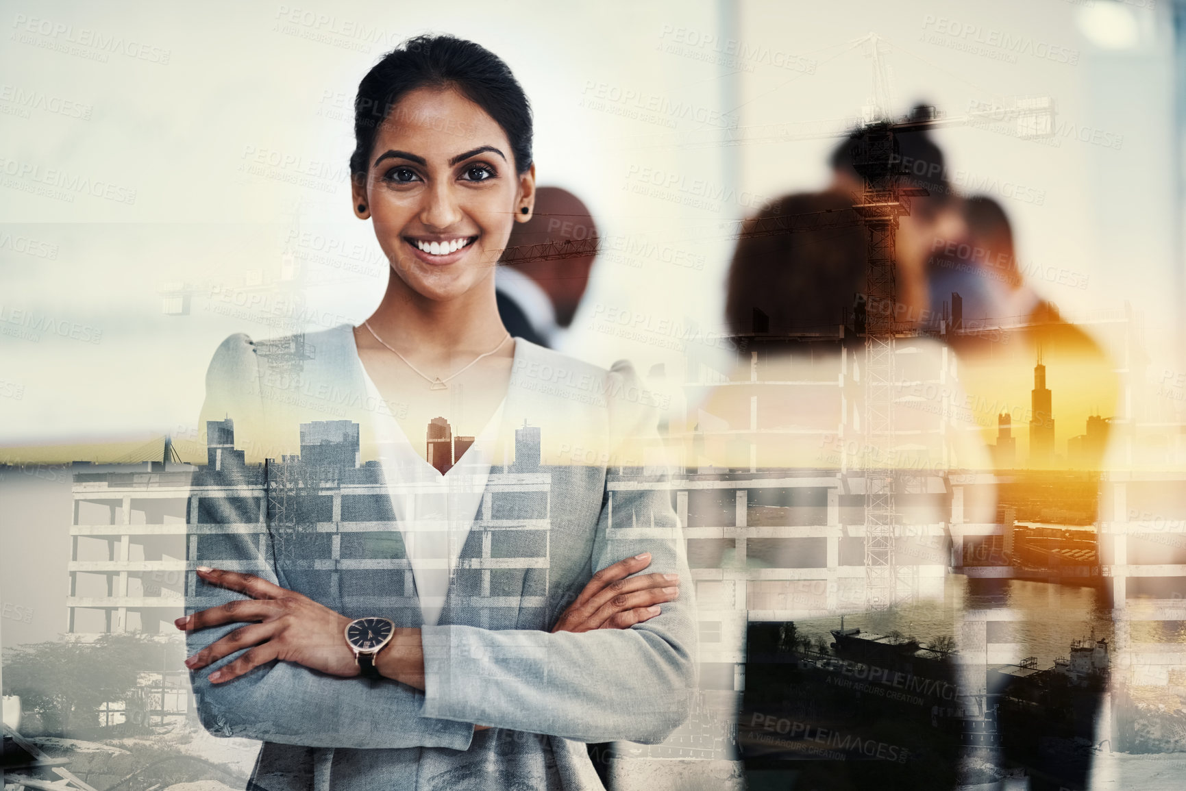 Buy stock photo A young businesswoman standing with her colleagues in the background superimposed over a cityscape