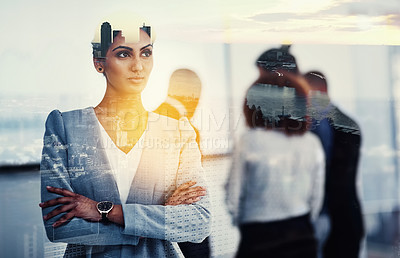 Buy stock photo A young businesswoman standing with her colleagues in the background superimposed over a cityscape