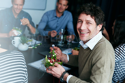 Buy stock photo Portrait of an office worker  eating lunch with coworkers at a boardroom table