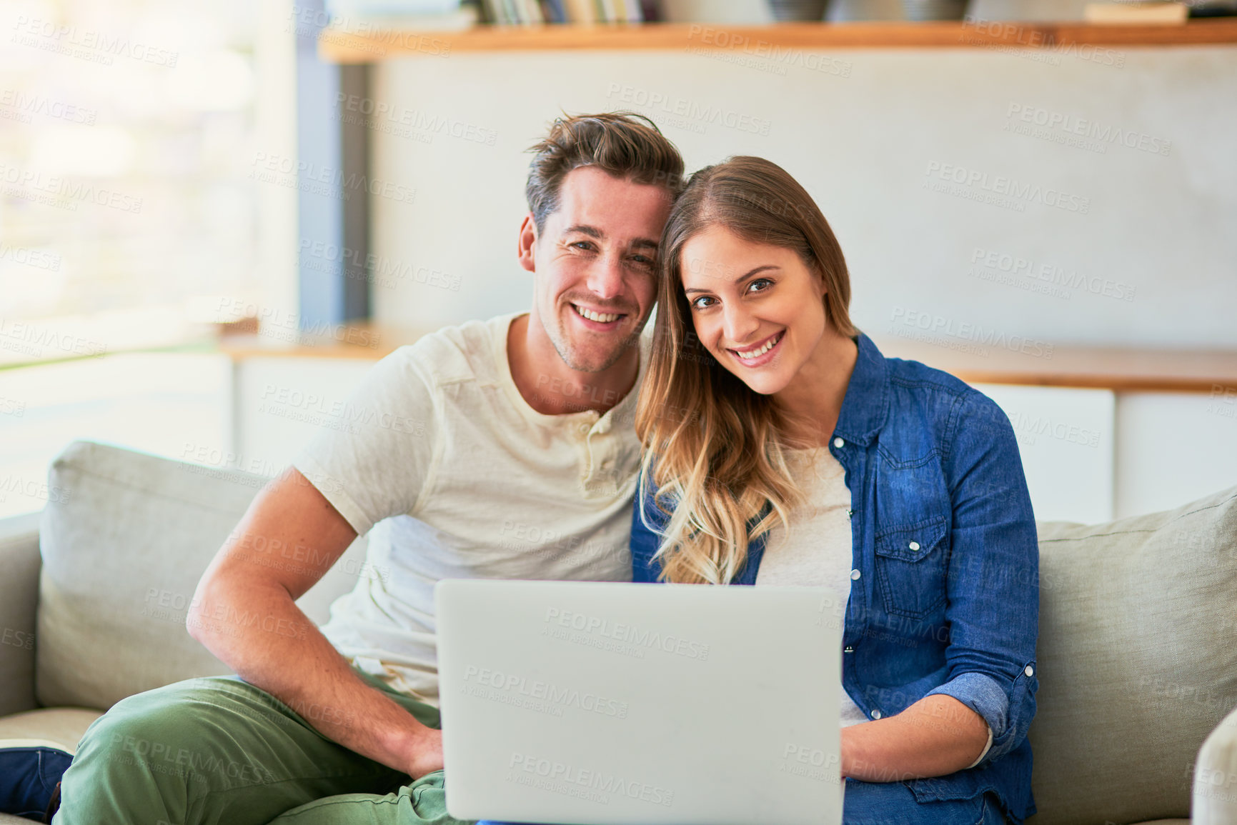 Buy stock photo Couple, portrait and laptop on sofa with happiness for approved application on rental confirmation for new apartment. Man, woman and together in home with internet for streaming comedy show and movie