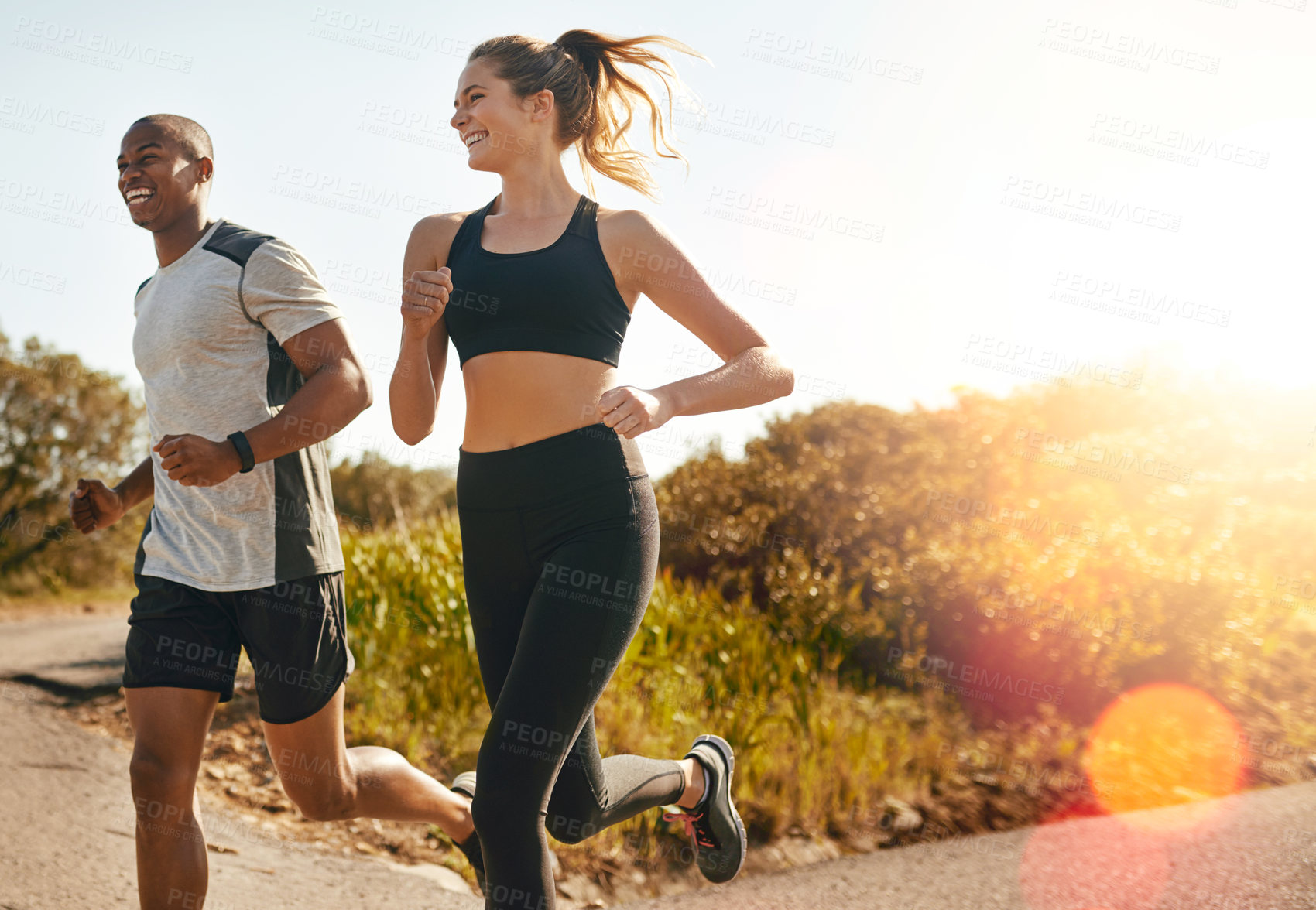 Buy stock photo Fitness, running and health with couple in road for workout, cardio performance and summer. Marathon, exercise and teamwork with black man and woman runner in nature for sports, training and race