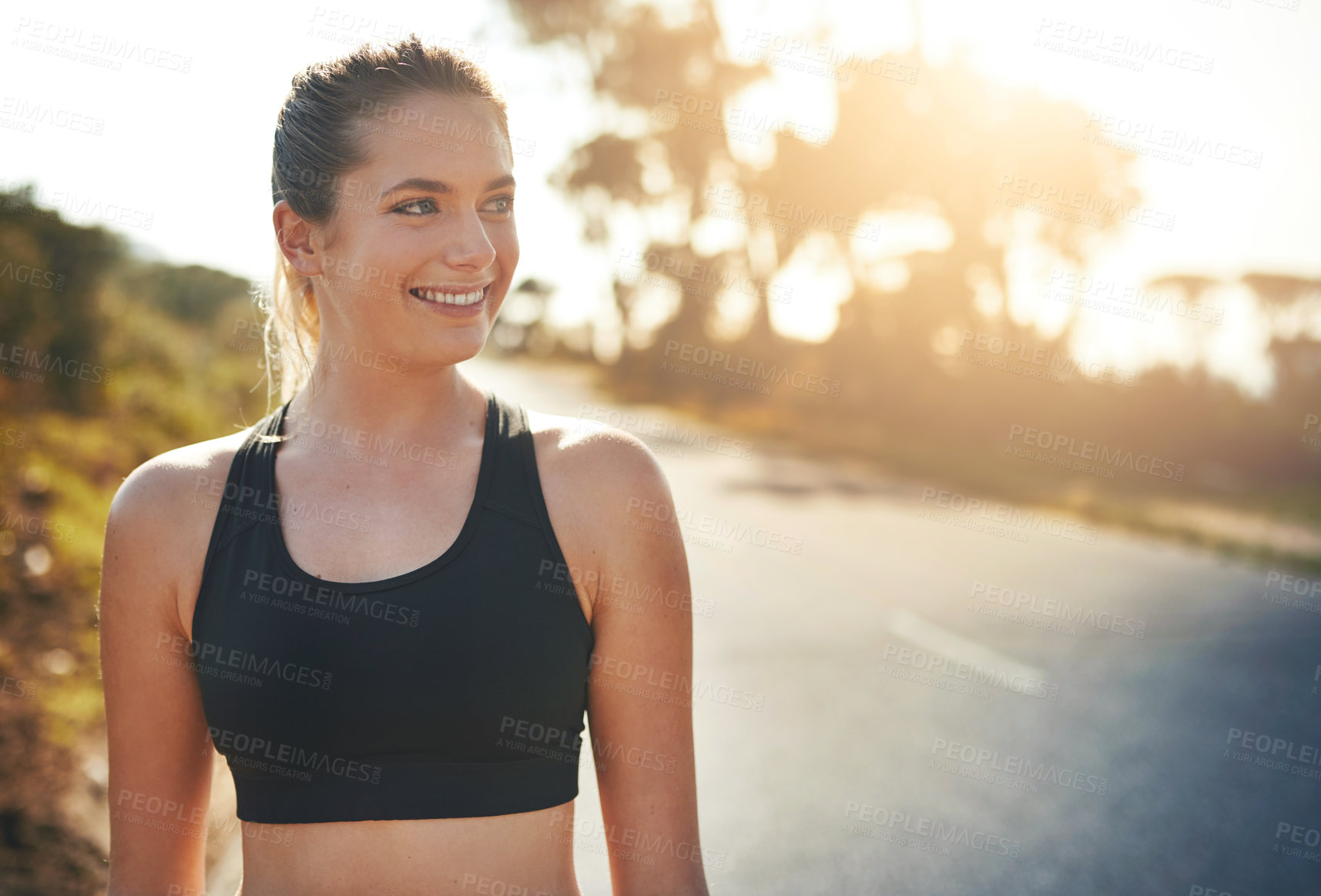 Buy stock photo Road, smile and woman with thinking for fitness, exercise and ready for marathon challenge with pride. Outdoor, female person and runner with confidence for training, wellness and healthy by sunset