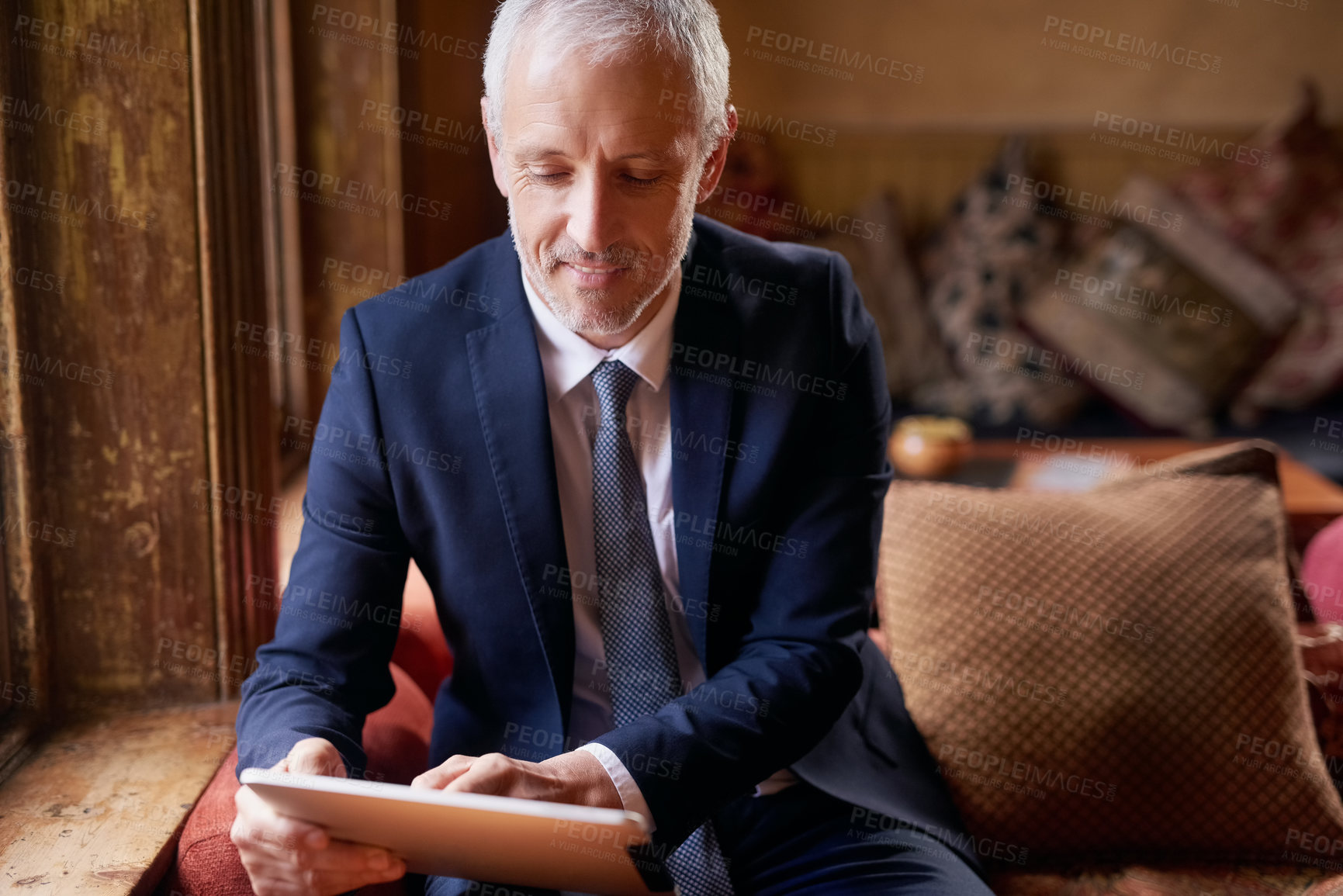 Buy stock photo Tablet, research and businessman reading in office for corporate legal information for case. Email, communication and mature attorney working on law project with digital technology in workplace.