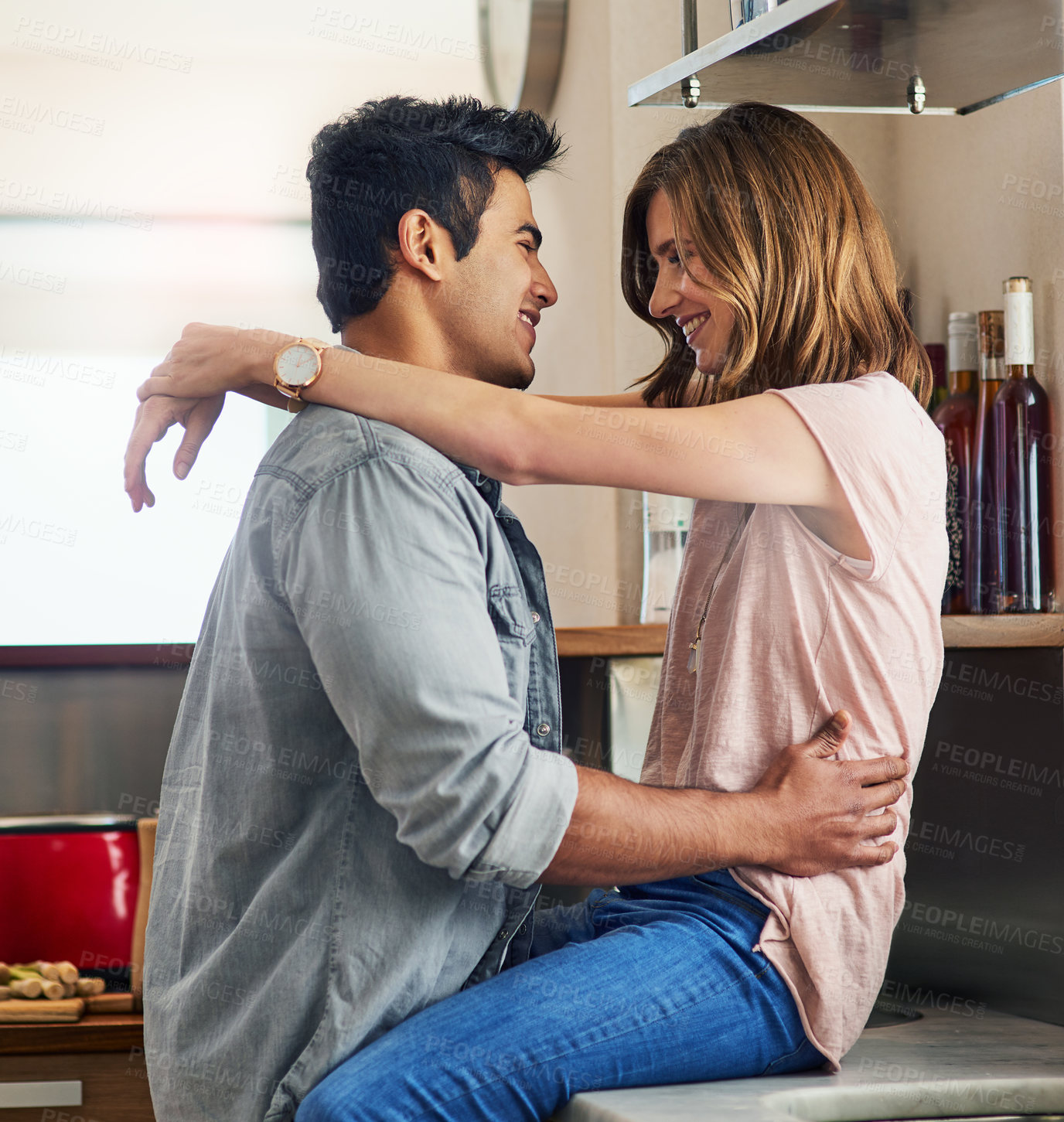 Buy stock photo Couple, people and happy with hug in kitchen counter to relax for bonding, love and support on break together. Home, relationship and romance with smile or affection for fun, enjoy and care as lovers