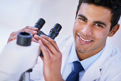 Buy stock photo Portrait, technician and microscope in laboratory for studying, research and innovation or chemistry. Happy, male person or medical scientist with tech for health breakthrough, analytics and biology