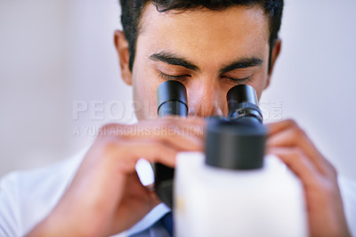 Buy stock photo Health technician, microscope and studying in laboratory for learning, research and innovation or chemistry. Happy, male person or medical scientist with tech for breakthrough, analytics and biology