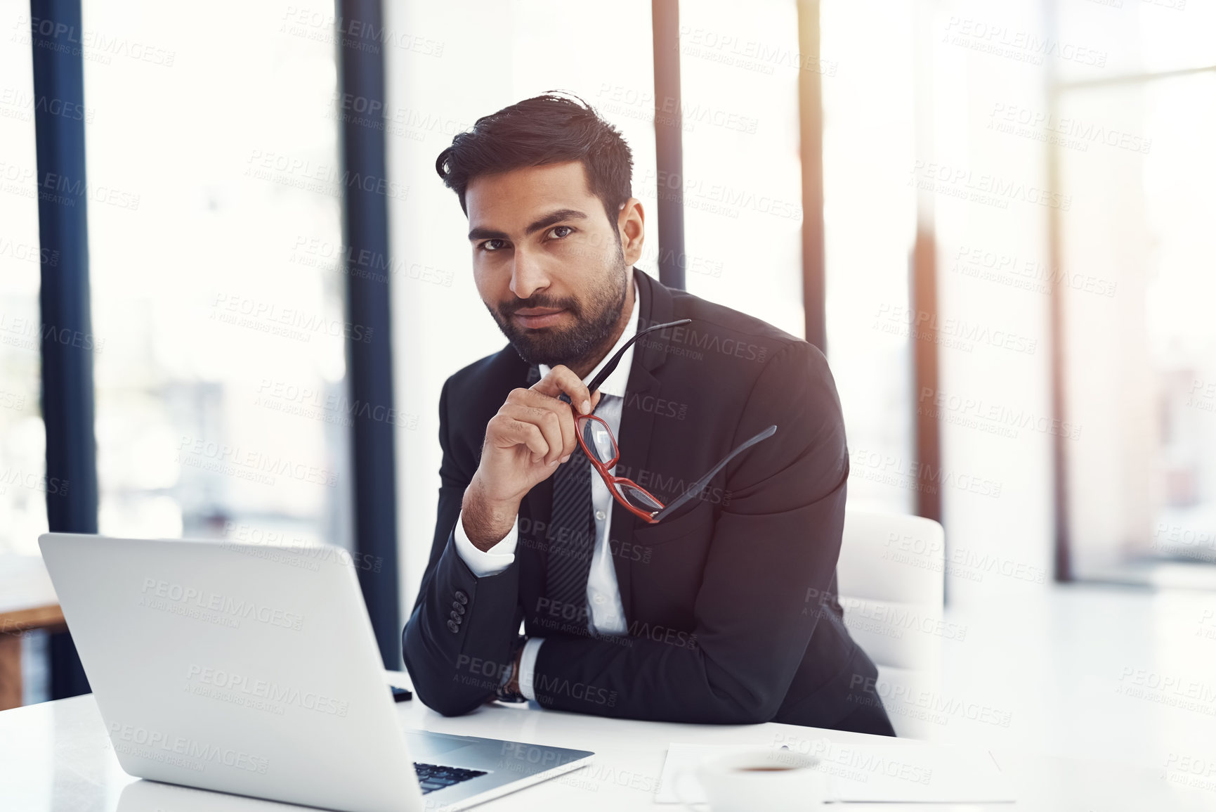 Buy stock photo Businessman, pride and portrait with laptop in office for case research, administration and contract review. Professional, lawyer or law firm for online consulting and planning legal proposal at desk