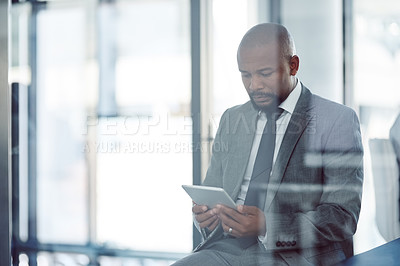 Buy stock photo Tablet, lawyer and black man in office for business, research or online browsing. Serious, digital technology and corporate African attorney, person or professional reading email, internet app or web